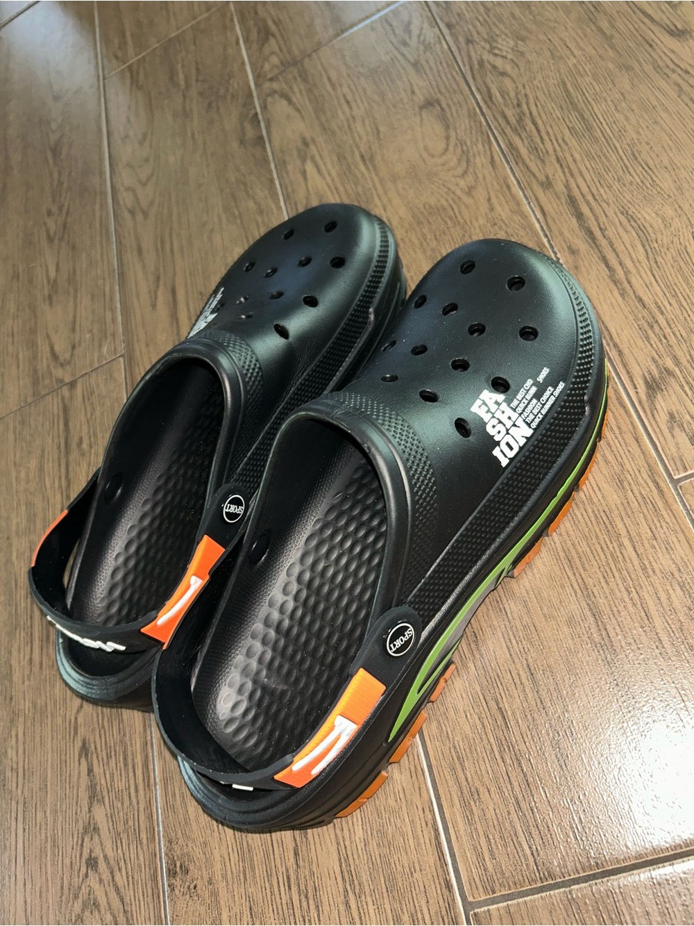 NWOT Men's Black Clog Sandals with Orange and Green Accents